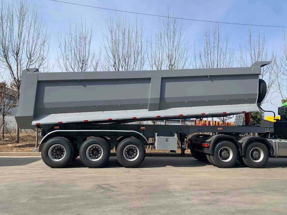 Bagaimana Material Lantai Dump Trailer Mempengaruhi Keausan dan Kecepatan Bongkar Bagaimana Material Lantai Dump Trailer Mempengaruhi Keausan dan Kecepatan Bongkar