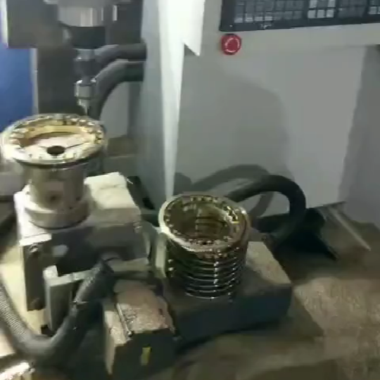Application of 360-degree arbitrary rotating cam divider automatic drilling machine industry