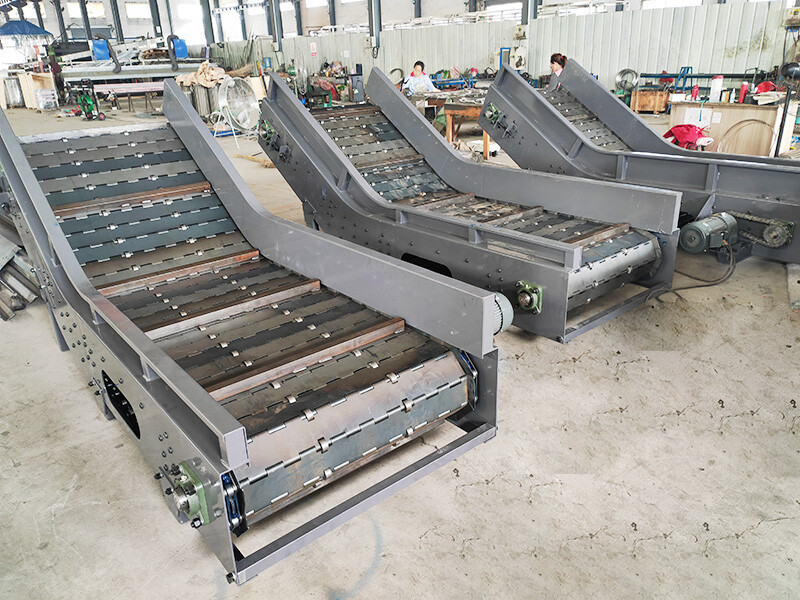 Conveyor papan rantai untuk tanjakan