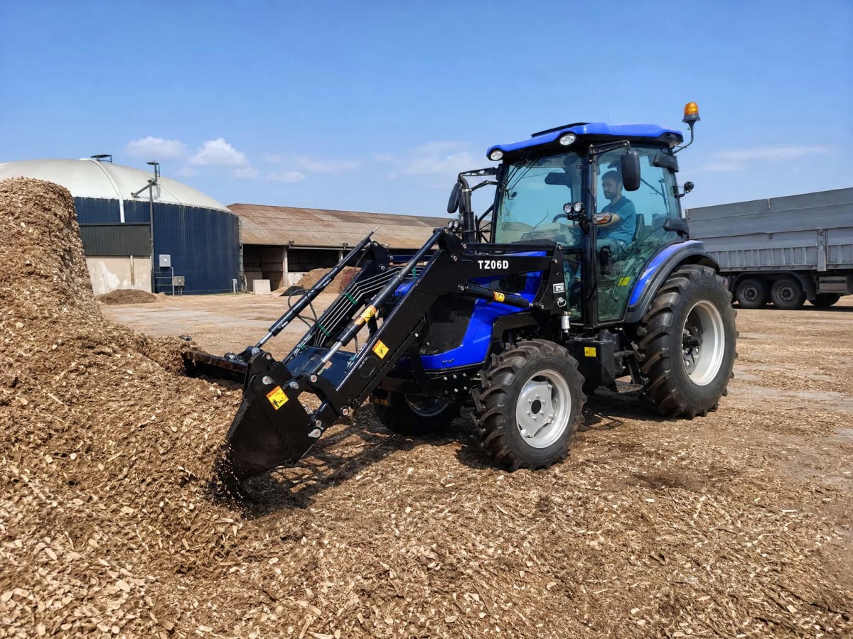 OXPLO 4 in 1 Bucket Tractor: A Versatile Solution for Farm Loading, Clearing, and Leveling