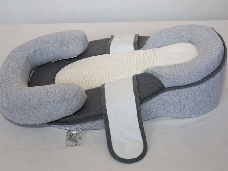 Infant anti-startle, anti-overflow, and anti-cushioning bed