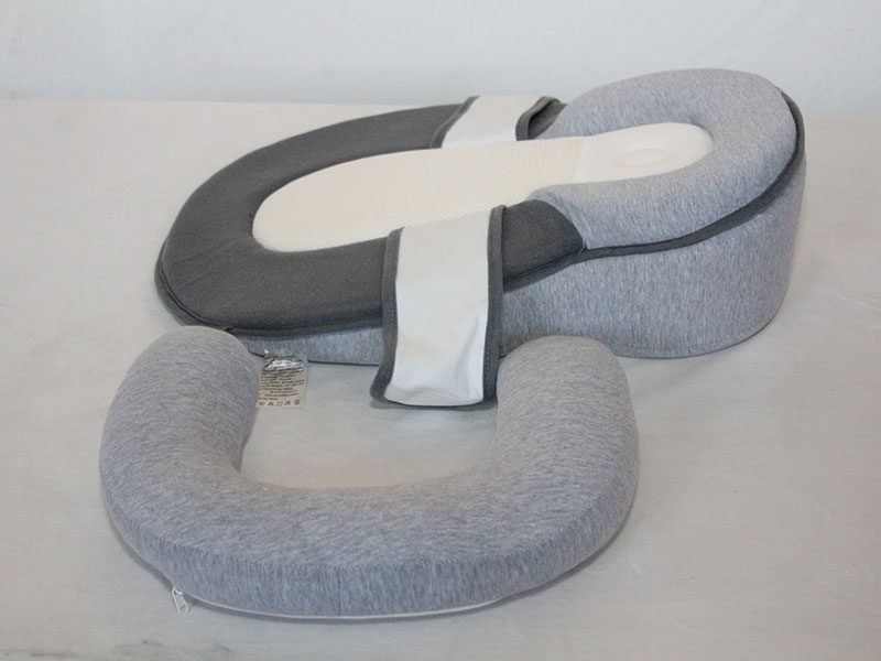 Infant anti-startle, anti-overflow, and anti-cushioning bed