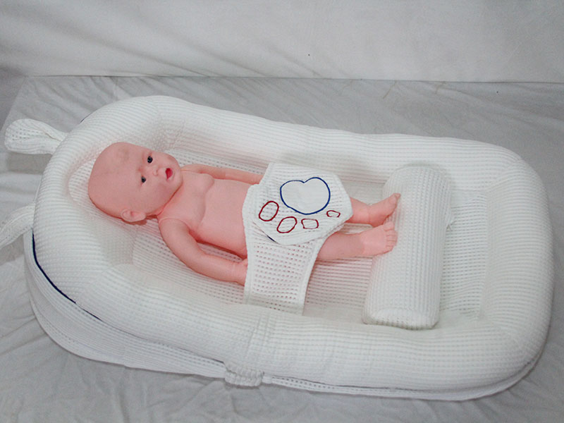 Newborn anti-startle and anti-pressure crib/anti-spit-up and anti-overflow crib