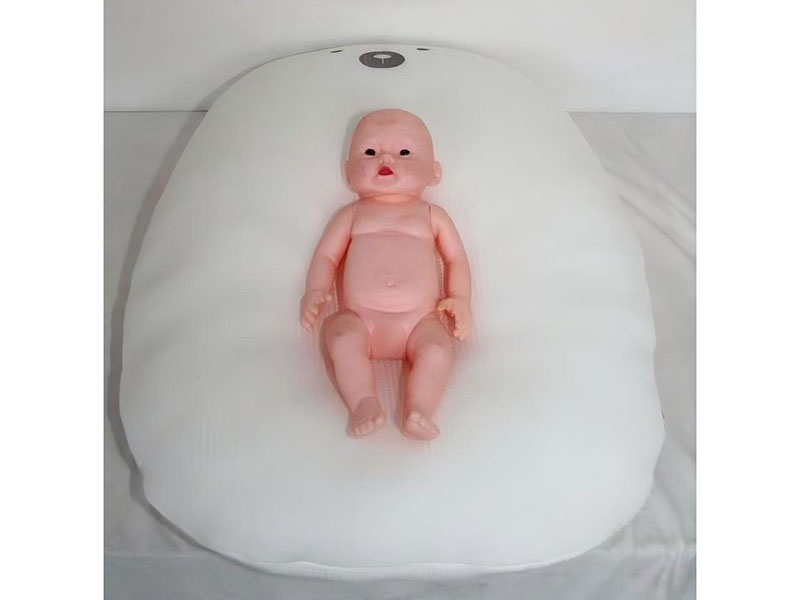 Newborn anti-startle and anti-pressure crib/anti-spit-up and anti-overflow crib